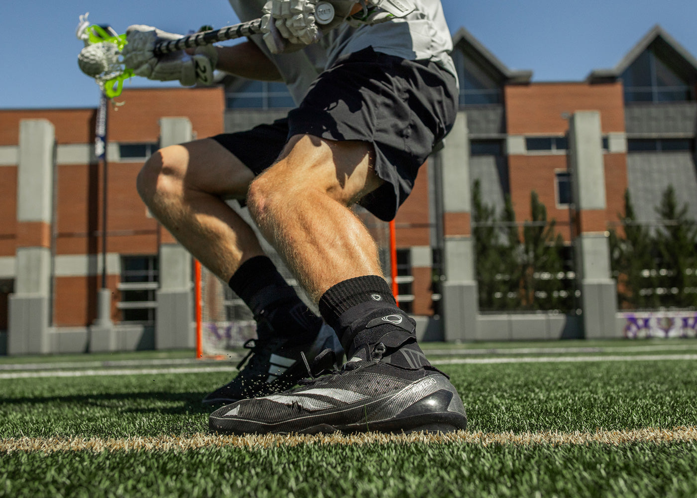 Lacrosse ankle brace with adaptive ankle support